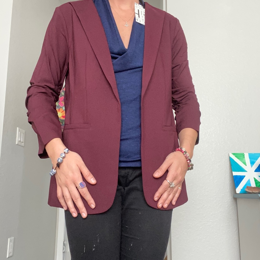 Maroon Stitch Fix blazer new with tags. Shows wrists. Fits a size small.